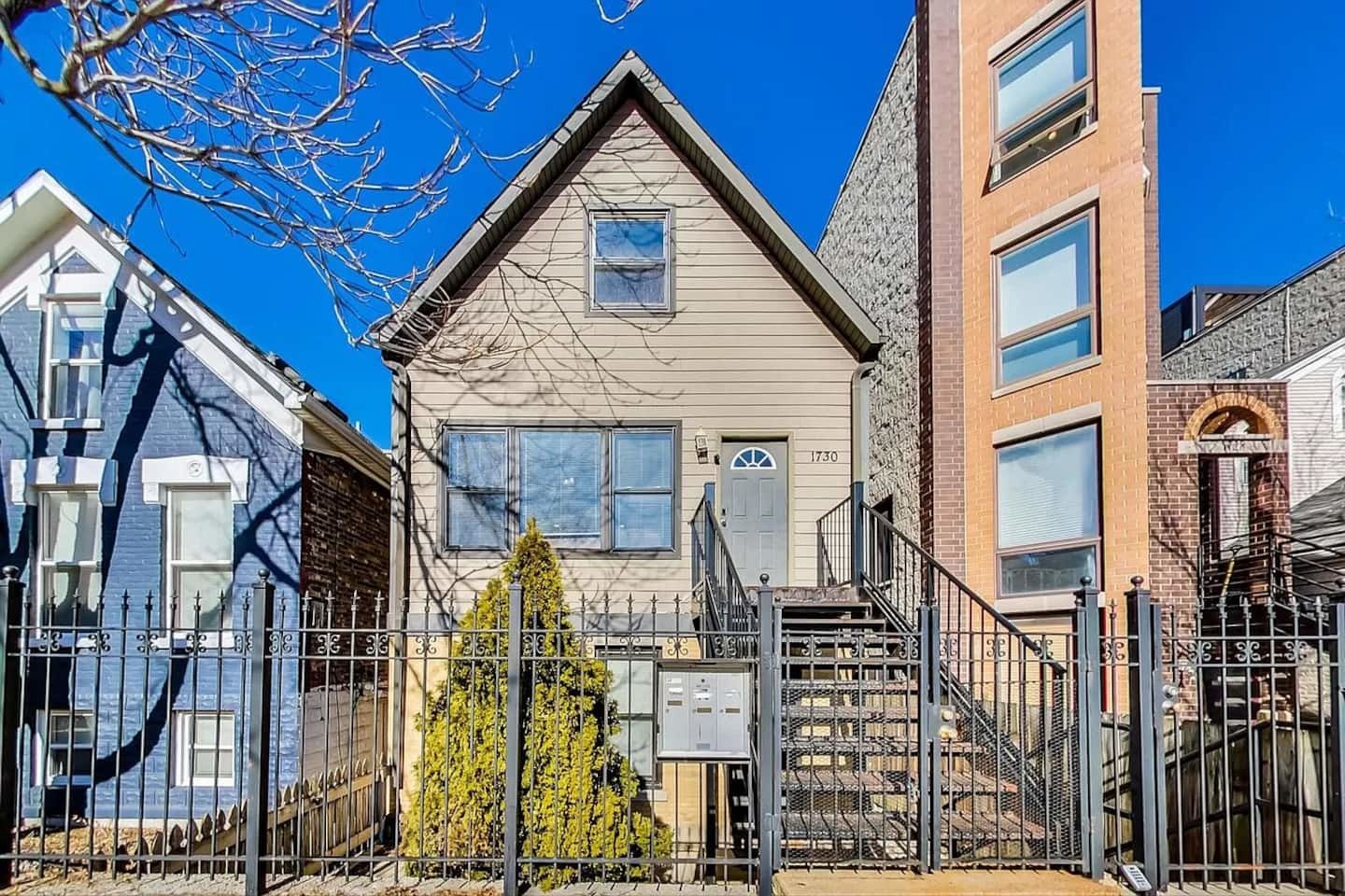1730 West Beach Avenue, Unit 1 Chicago, IL 60622 - Photo 1 of 16 a view of a house with street