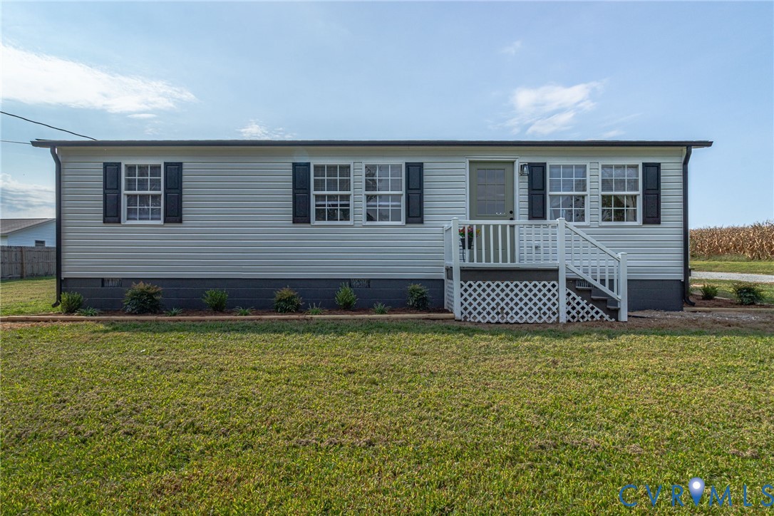 36 Bundick Road Lottsburg, VA 22511 - Photo 35 of 50 Light-toned horizontal siding with dark shutters,