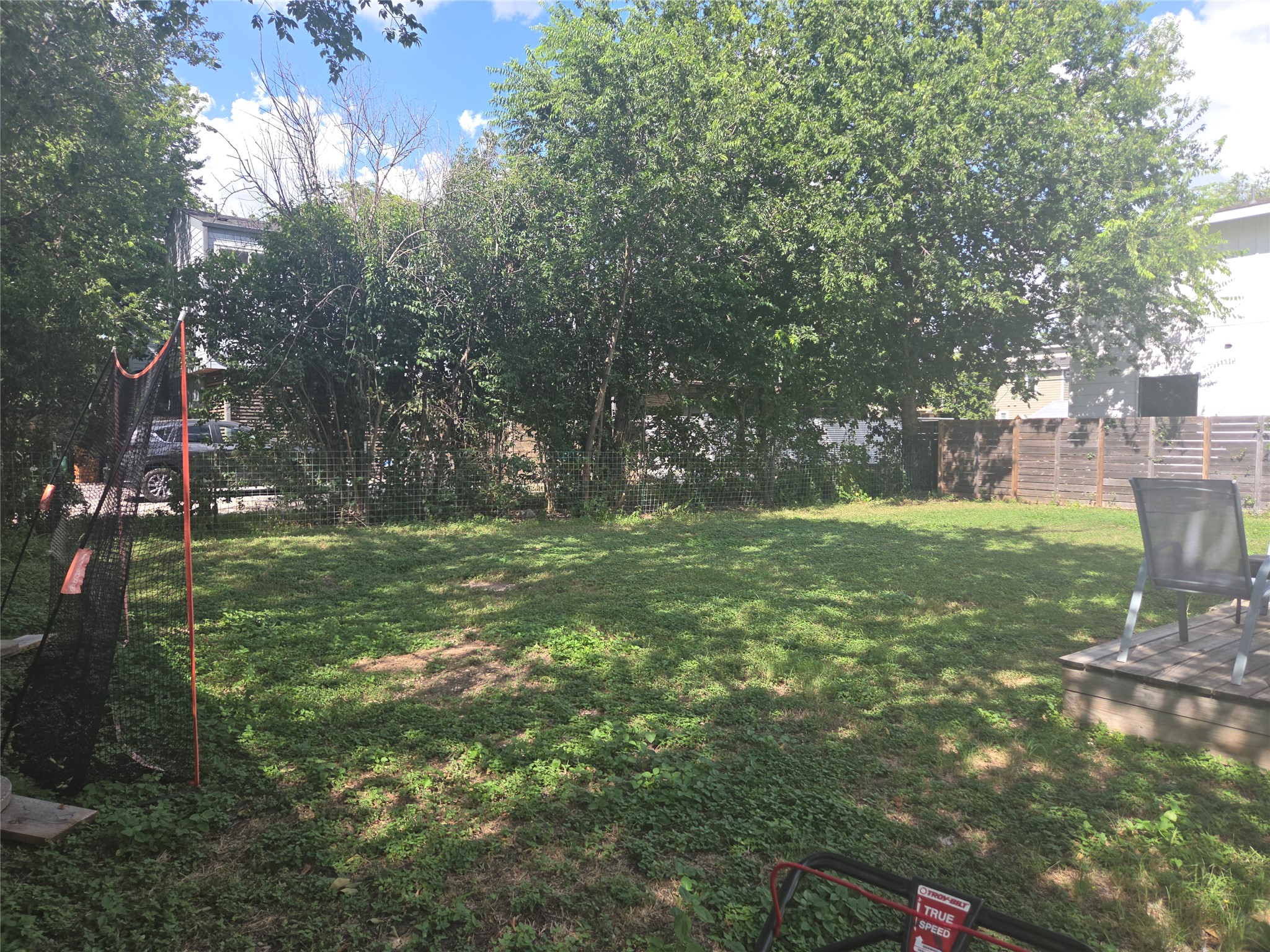 922 East 50th Street Austin, TX 78751 - Photo 34 of 35 A spacious backyard with mature trees offers a private green oasis.
