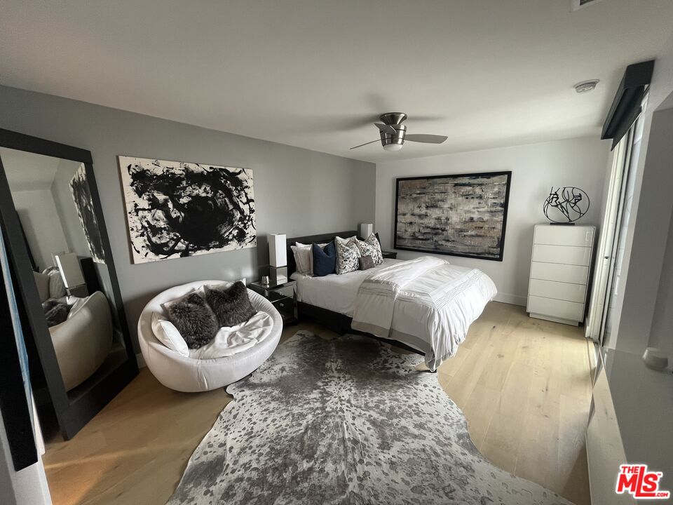 723 Palisades Beach Road, Unit 211 Santa Monica, CA 90402 - Photo 11 of 30 a living room with furniture and a couch