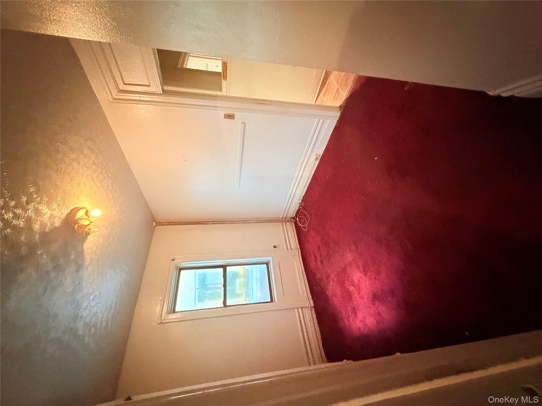 501 West 156th Street, Unit 22 Manhattan, NY 10032 - Photo 5 of 13 Carpeted empty room featuring a textured ceiling and baseboards