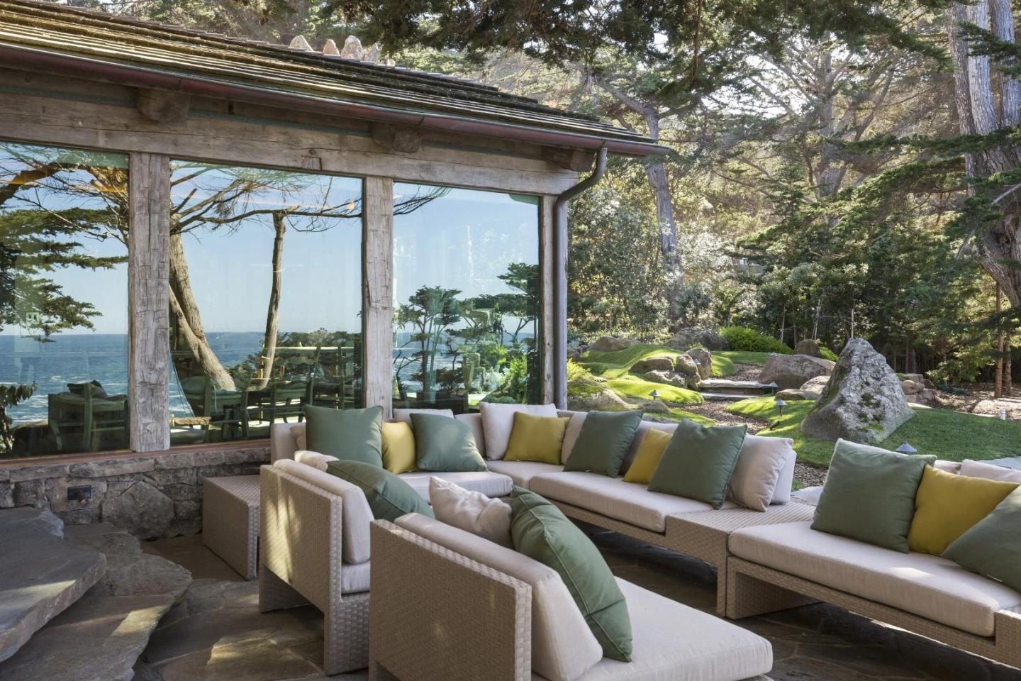 157-163 Spindrift Road Carmel, CA 93923 - Photo 22 of 100 a living room with furniture and a floor to ceiling window