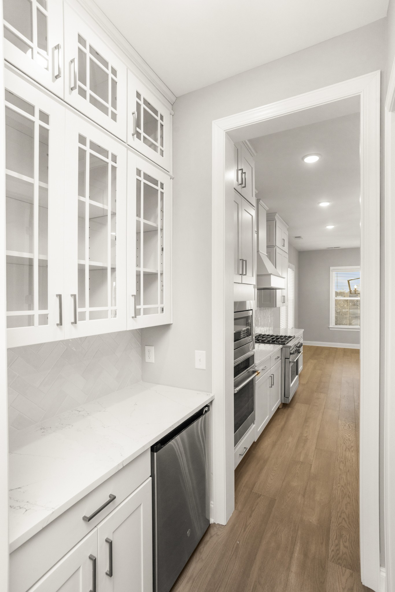 1933 Harmony Road Spring Hill, TN 37174 - Photo 11 of 50 a kitchen with granite countertop a stove and a refrigerator