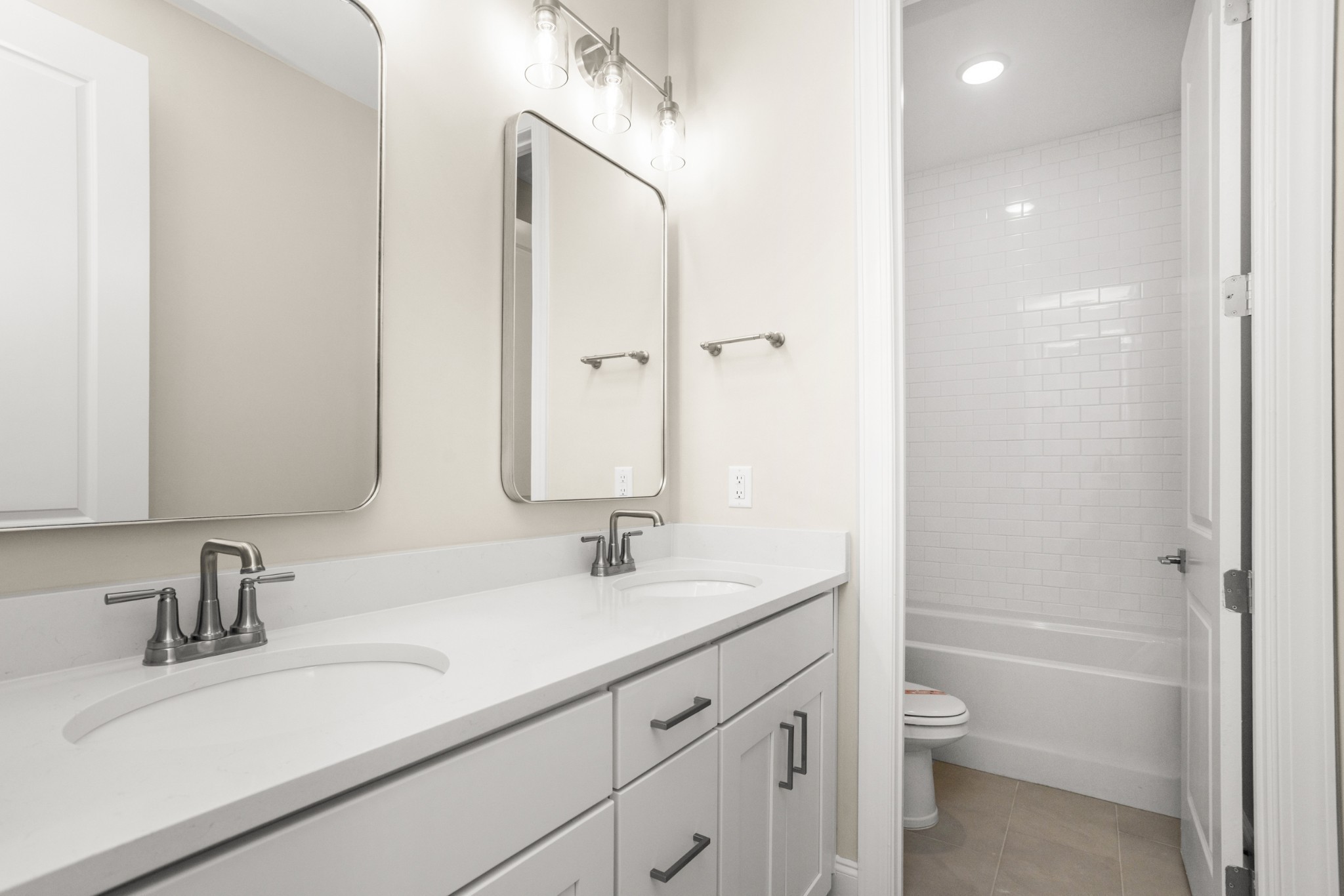 1933 Harmony Road Spring Hill, TN 37174 - Photo 36 of 50 a bathroom with a sink a toilet and shower