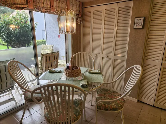 a view of a balcony with furniture