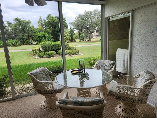 a outdoor living space with furniture and garden view