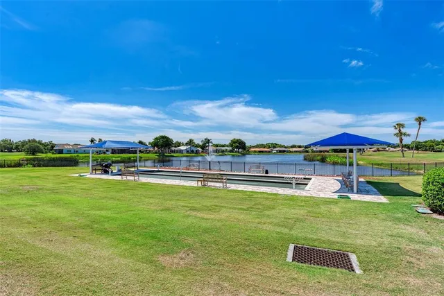 a view of a lake with a city