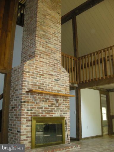 13101 Dover Road Reisterstown, MD 21136 - Photo 14 of 23 2 story antique brick fireplace