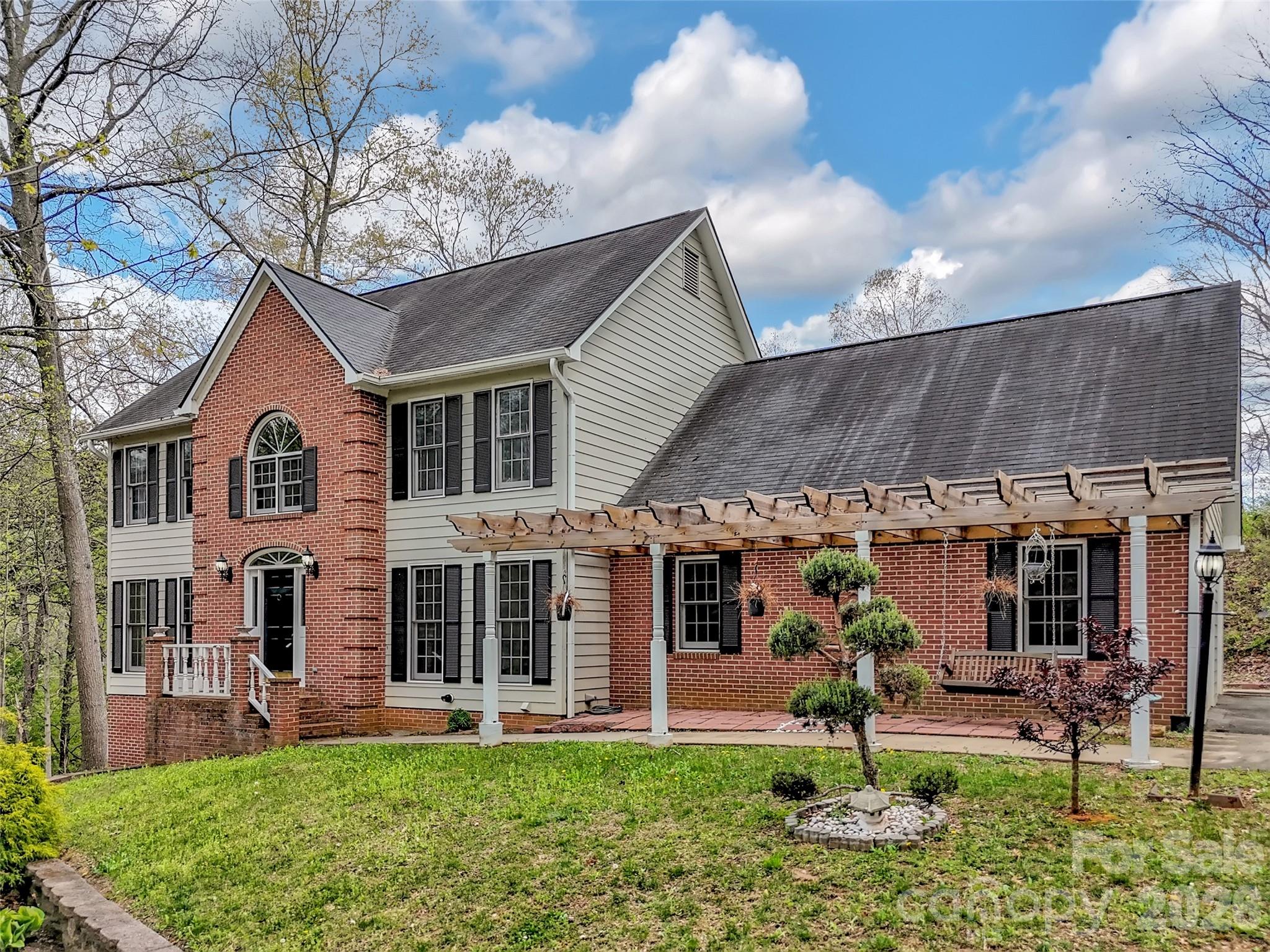 29 Tillman Road Lake Junaluska, NC 28745 - Photo 2 of 46 front view of a house with a yard