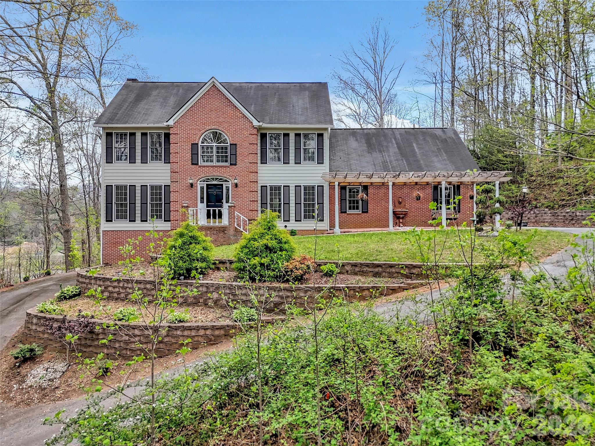 29 Tillman Road Lake Junaluska, NC 28745 - Photo 37 of 46 front view of a house with a yard
