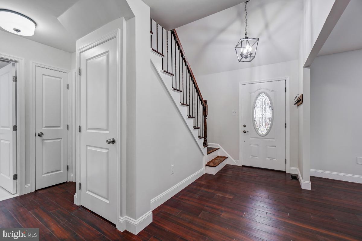 8807 Gramercy Lane Laurel, MD 20708 - Photo 3 of 69 Brand new hardwood floors and custom lighting.