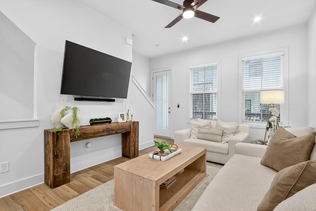 4455 Dandelion Lane Atlanta, GA 30342 - Photo 16 of 44 a living room with furniture and a flat screen tv