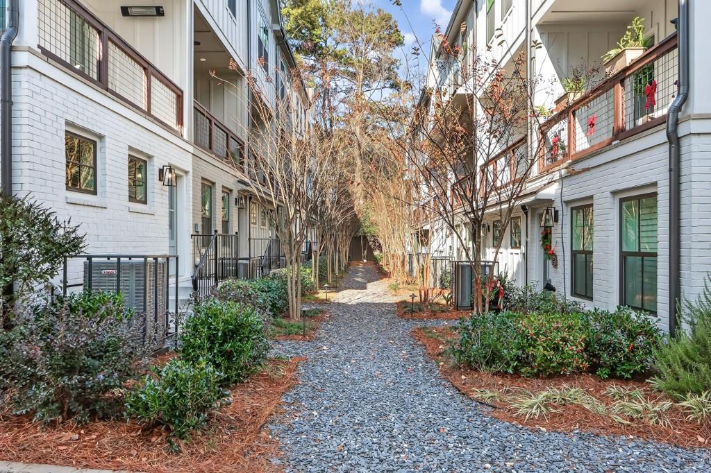 4455 Dandelion Lane Atlanta, GA 30342 - Photo 3 of 44 a view of a building with a yard