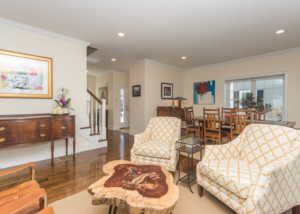 128 Church Street, Unit 2 Waltham, MA 02452 - Photo 6 of 41 a living room with furniture and a table