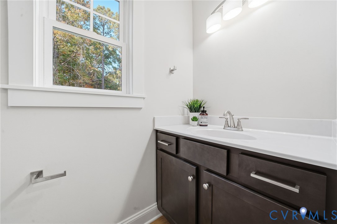 2914 Congress Road North Chesterfield, VA 23237 - Photo 19 of 23 a bathroom with a sink and a mirror