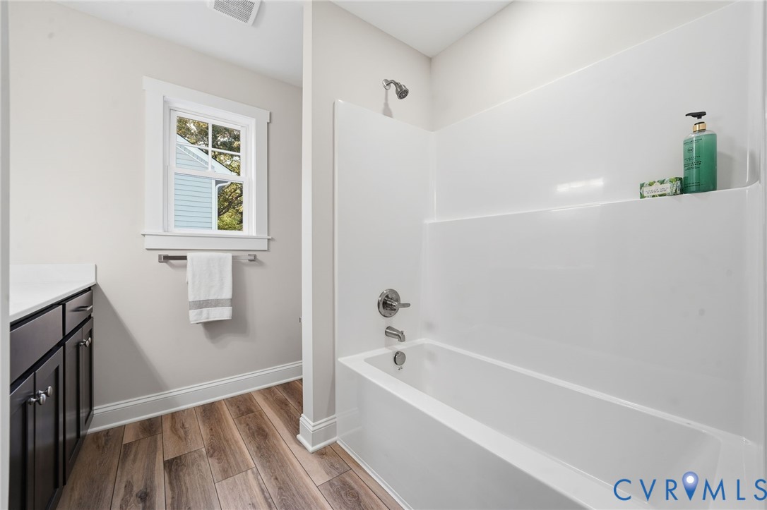 2914 Congress Road North Chesterfield, VA 23237 - Photo 21 of 23 a bathroom with a bathtub and a shower