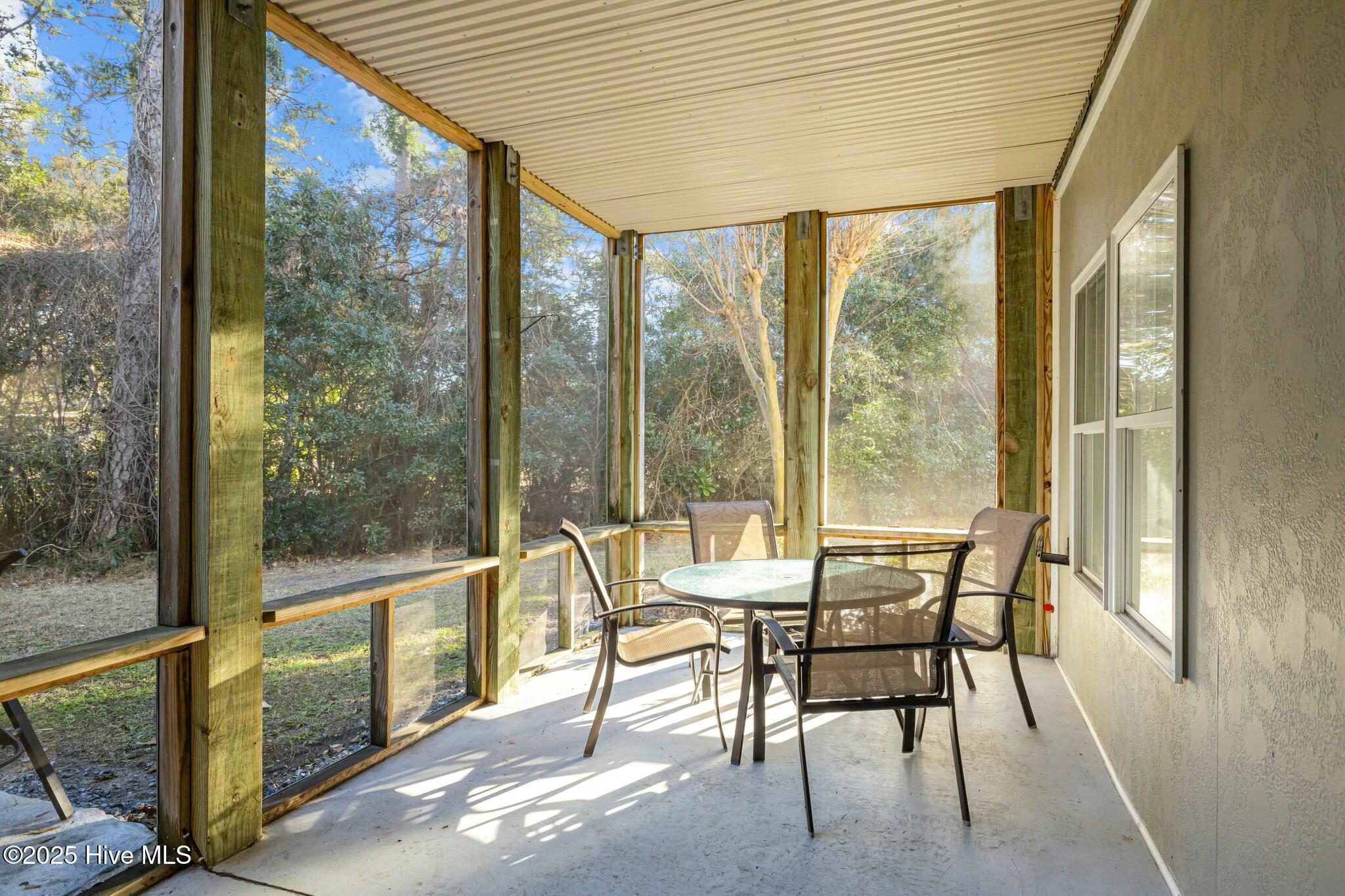 200 Lighthouse Lane, Unit B1 Cedar Point, NC 28584 - Photo 15 of 42 Screened Back Porch