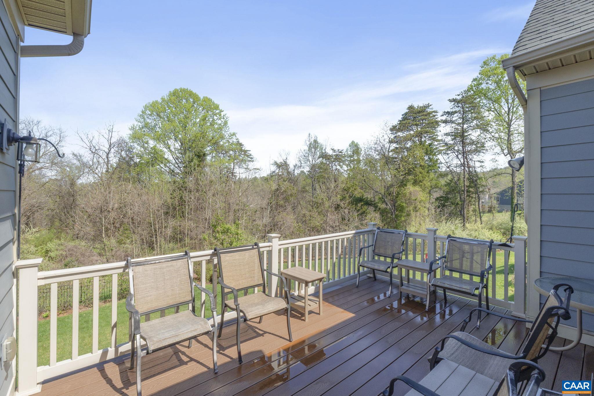 1377 Delphi Lane Charlottesville, VA 22911 - Photo 19 of 48 a view of a chairs and table on the deck