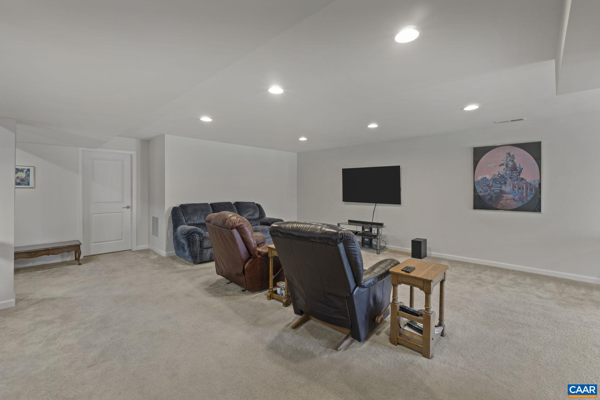 1377 Delphi Lane Charlottesville, VA 22911 - Photo 31 of 48 a room with furniture and a flat screen tv