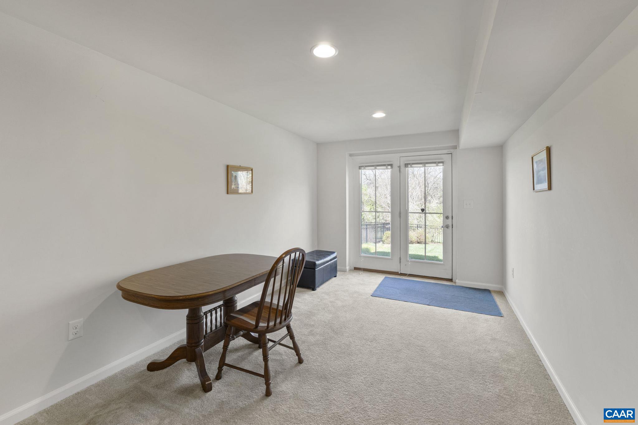 1377 Delphi Lane Charlottesville, VA 22911 - Photo 33 of 48 a workspace with furniture and a window
