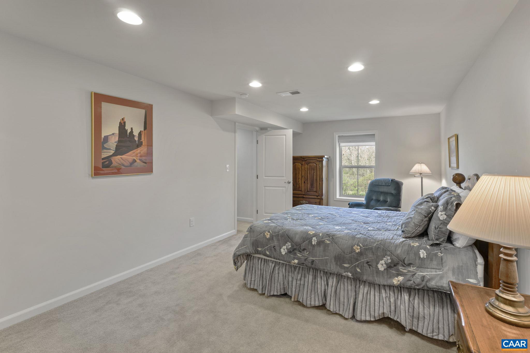 1377 Delphi Lane Charlottesville, VA 22911 - Photo 35 of 48 a bedroom with bed and window