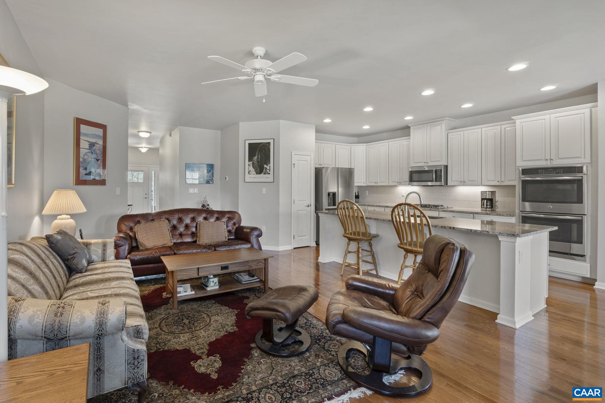 1377 Delphi Lane Charlottesville, VA 22911 - Photo 10 of 48 a living room with furniture and kitchen view