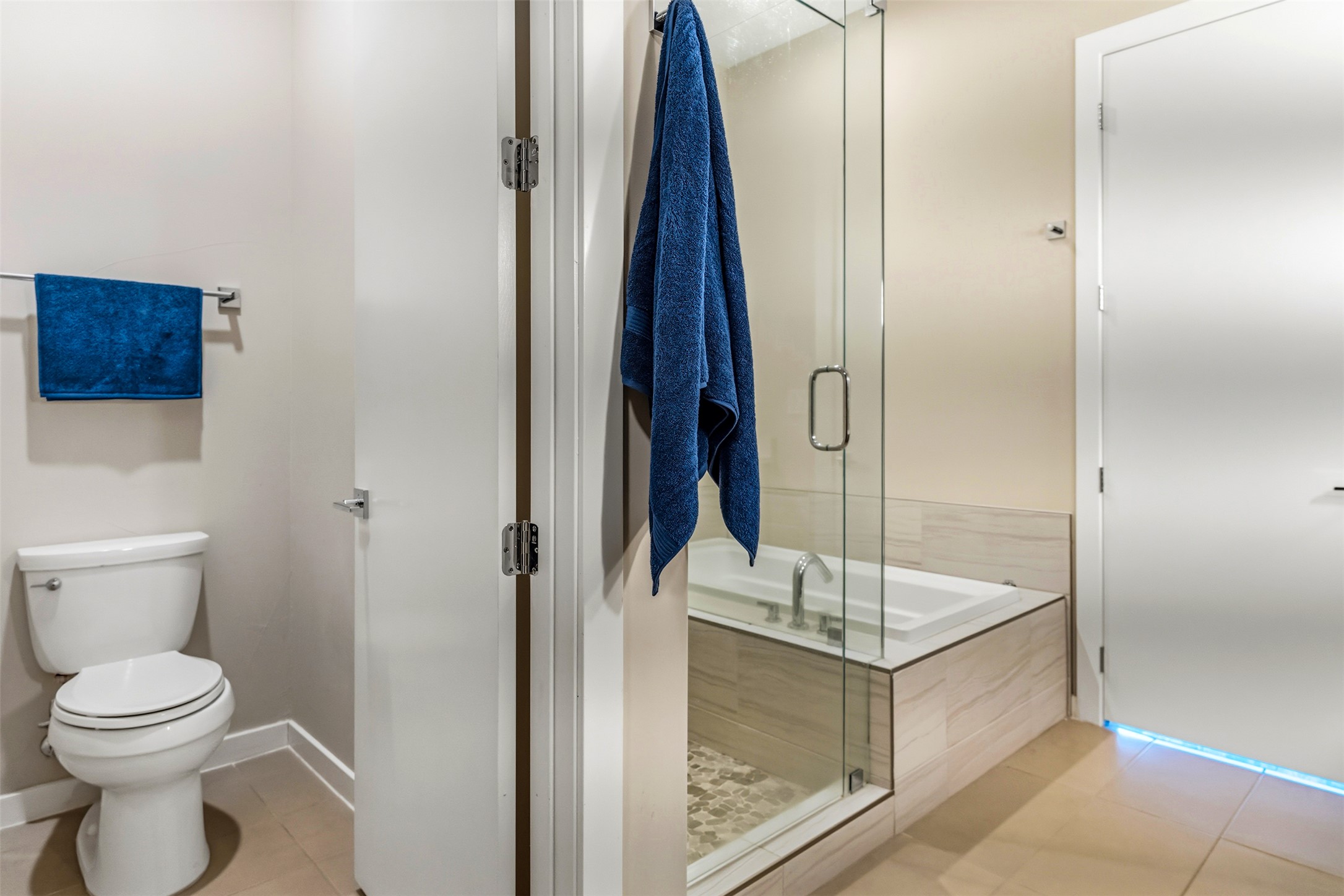 5921 Hiline Road, Unit 2304 Austin, TX 78734 - Photo 23 of 39 a bathroom with a granite countertop sink a toilet and shower
