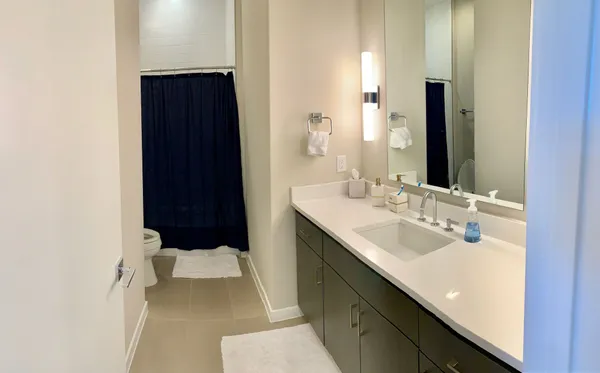 a front view of building with yard