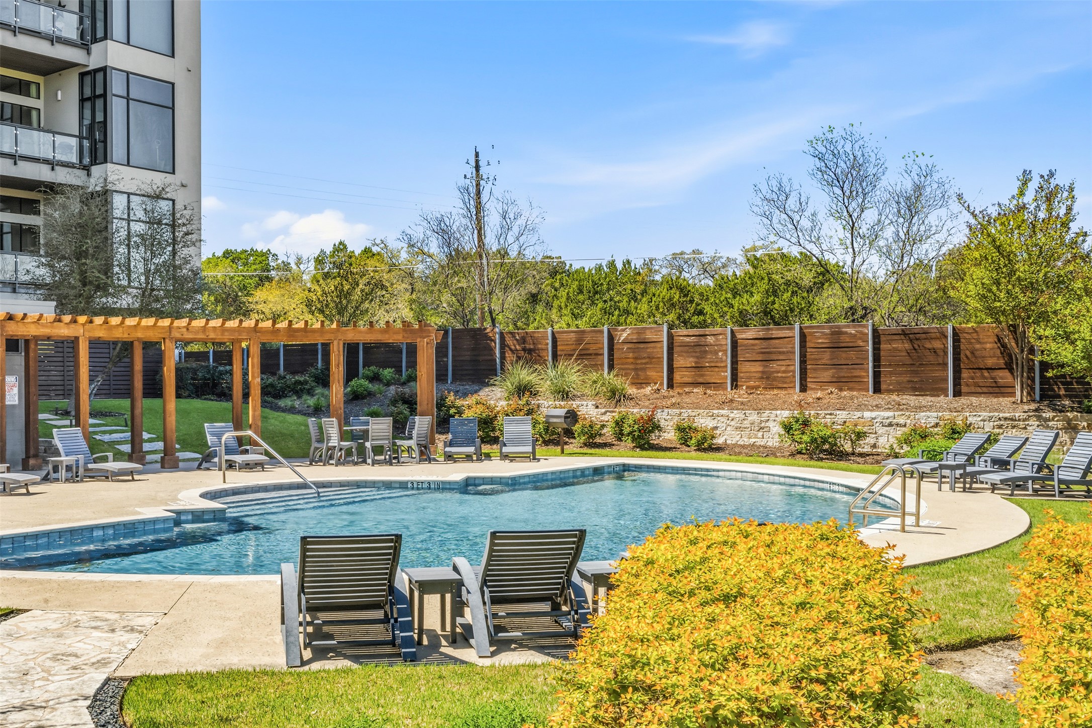 5921 Hiline Road, Unit 2304 Austin, TX 78734 - Photo 35 of 39 a view of a swimming pool with outdoor seating