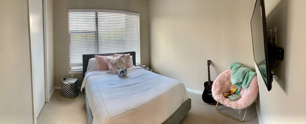 5921 Hiline Road, Unit 2304 Austin, TX 78734 - Photo 8 of 39 a bedroom with a bed and a large window