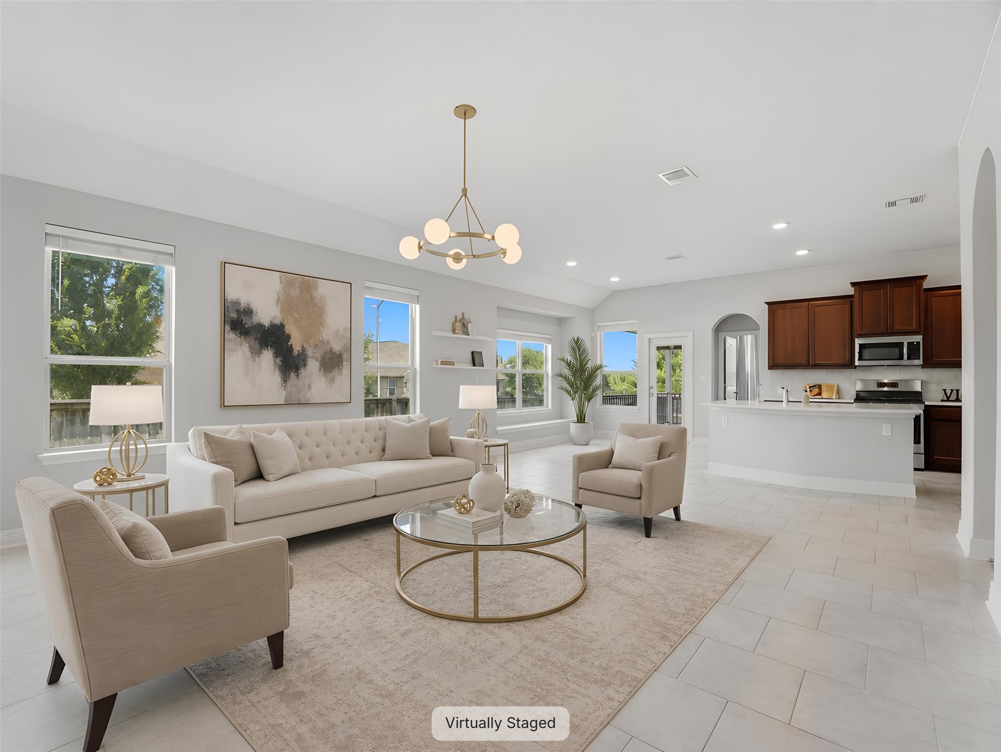 2132 Ringstaff Road Leander, TX 78641 - Photo 2 of 39 An open-concept living space integrates a well-appointed kitchen, ideal for gatherings and everyday comfort.
