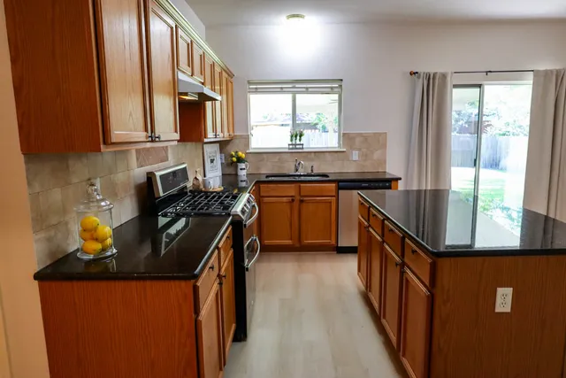 a view of a living room and hardwood floor