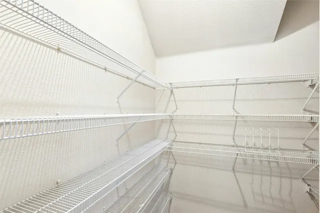 a view of a workspace with furniture