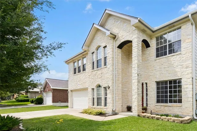 a view of swimming pool with a garden