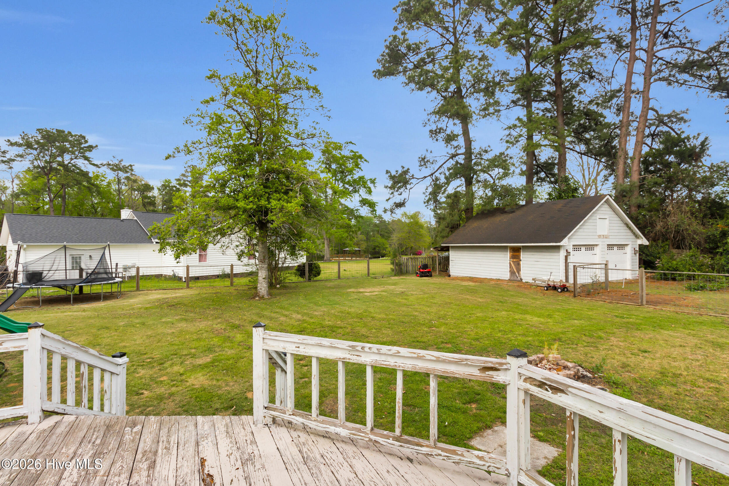 308 Pollock Street Pollocksville, NC 28573 - Photo 6 of 48 Wrap around porch-rear