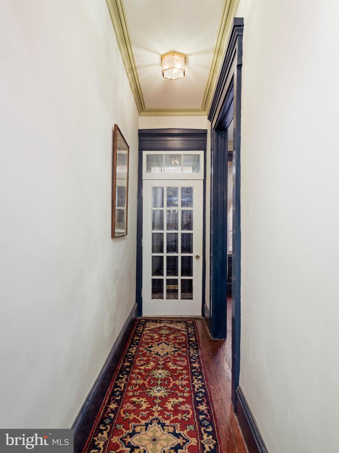 223 Carpenter Street Philadelphia, PA 19147 - Photo 12 of 42 a view of hallway with wooden floor