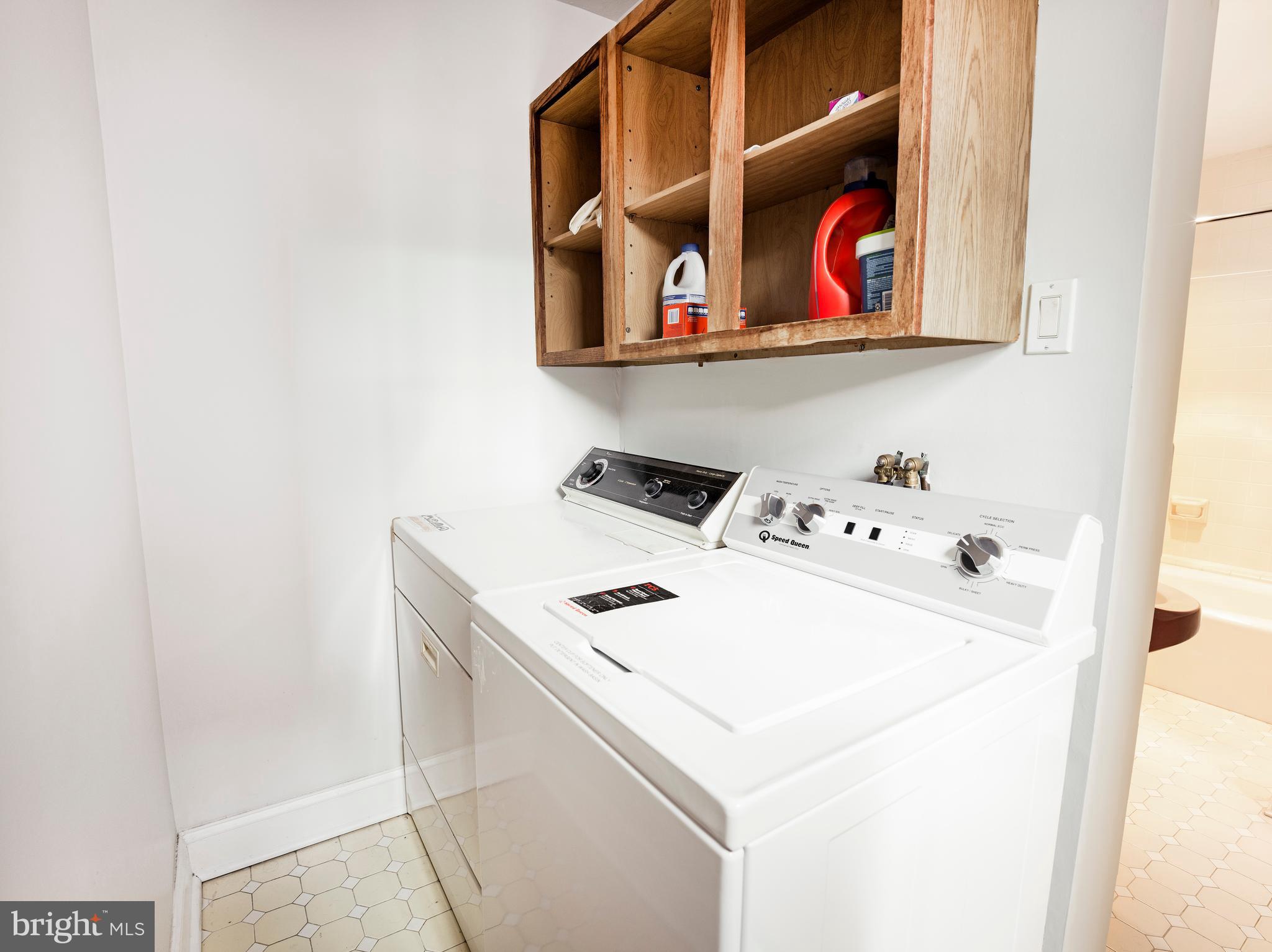 223 Carpenter Street Philadelphia, PA 19147 - Photo 26 of 42 a utility room with dryer and washer