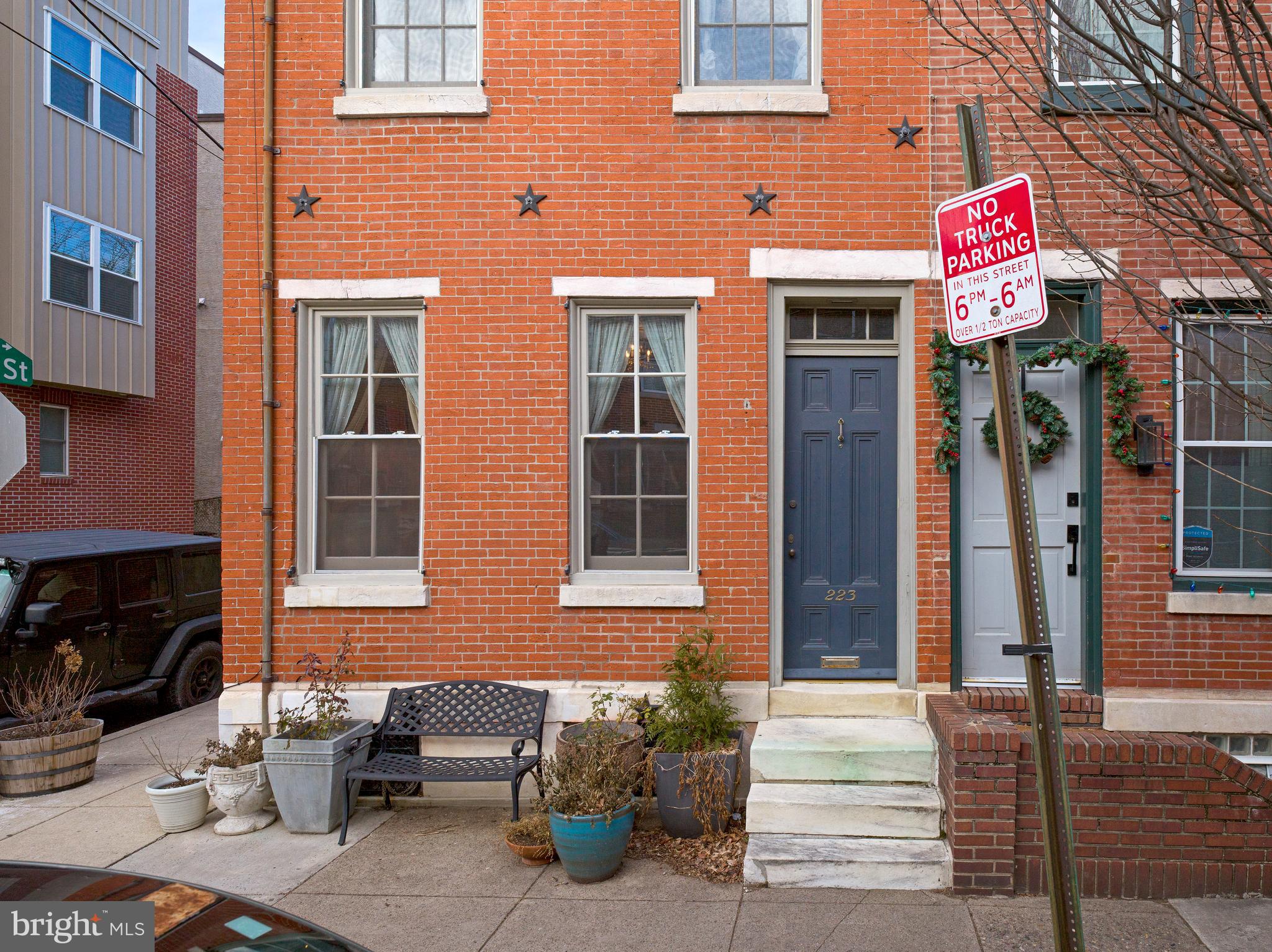 223 Carpenter Street Philadelphia, PA 19147 - Photo 3 of 42 a front view of a building with outdoor seating