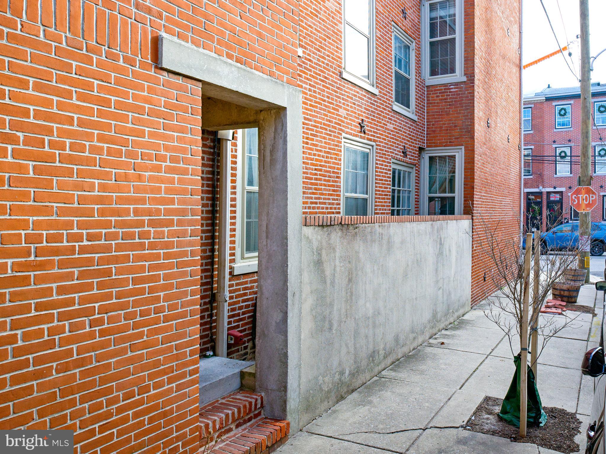 223 Carpenter Street Philadelphia, PA 19147 - Photo 6 of 42 a view of a brick buildings with entryway doors