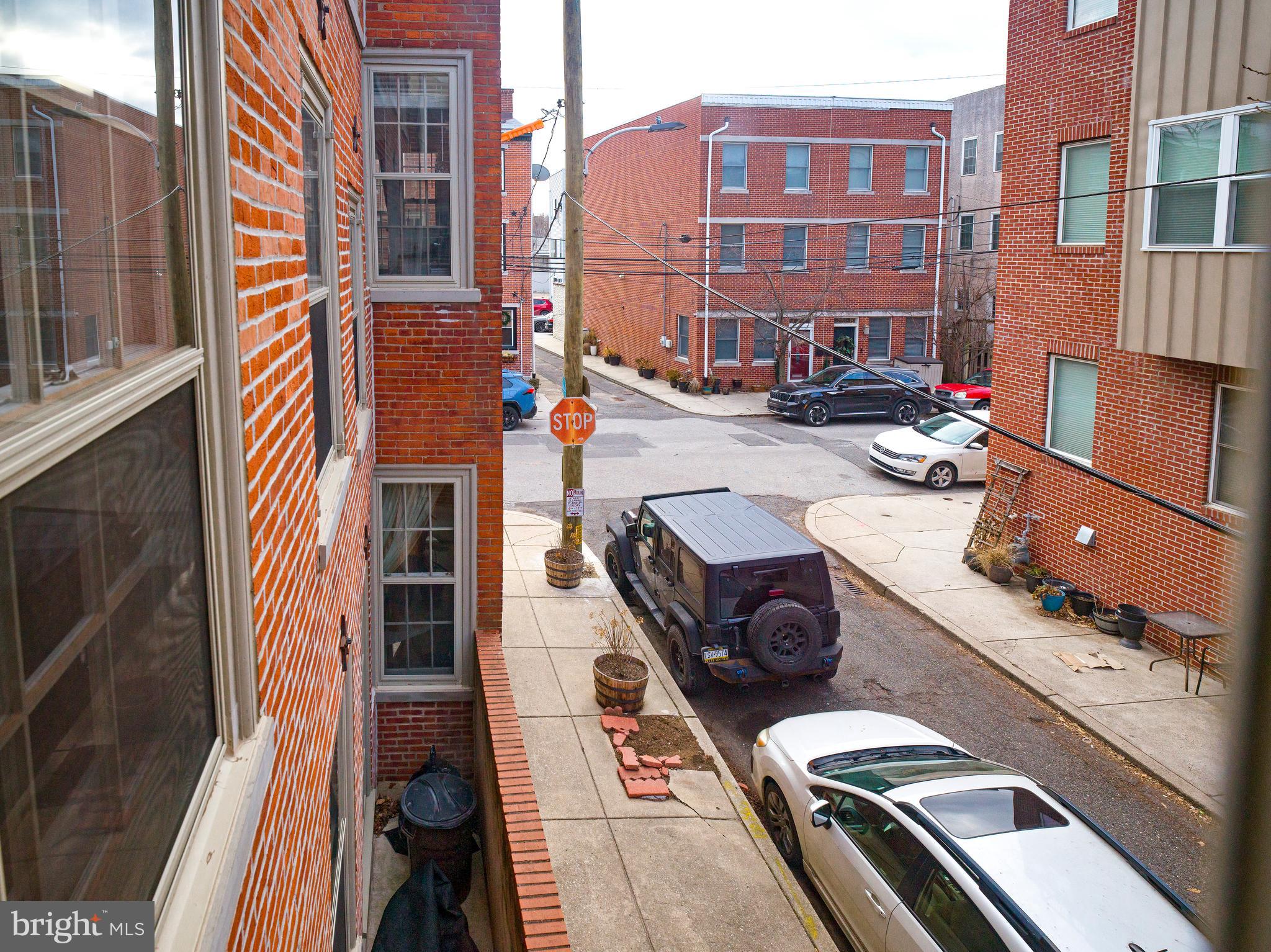 223 Carpenter Street Philadelphia, PA 19147 - Photo 10 of 42 a city street lined with tall buildings