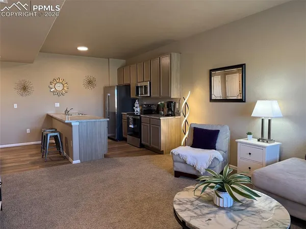 a living room with furniture and a window