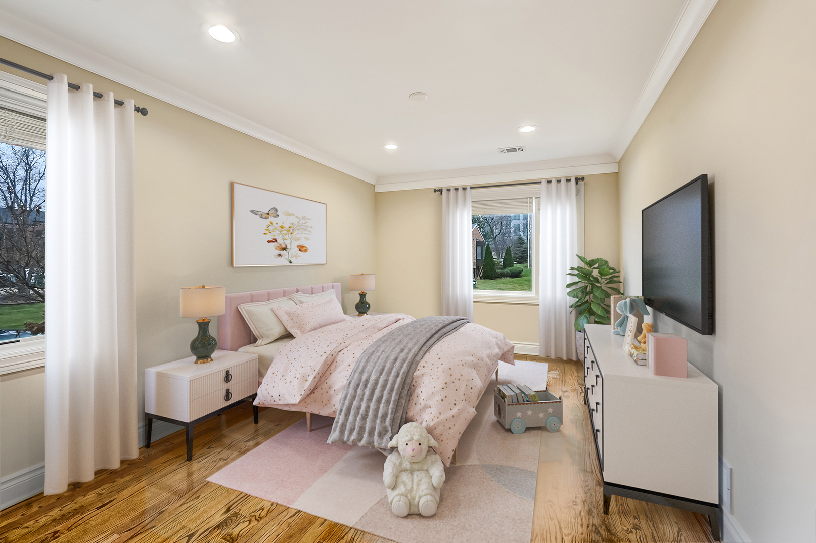 2-s719 Williamsburg Court Oak Brook, IL 60523 - Photo 32 of 48 a bedroom with a bed and a flat screen tv