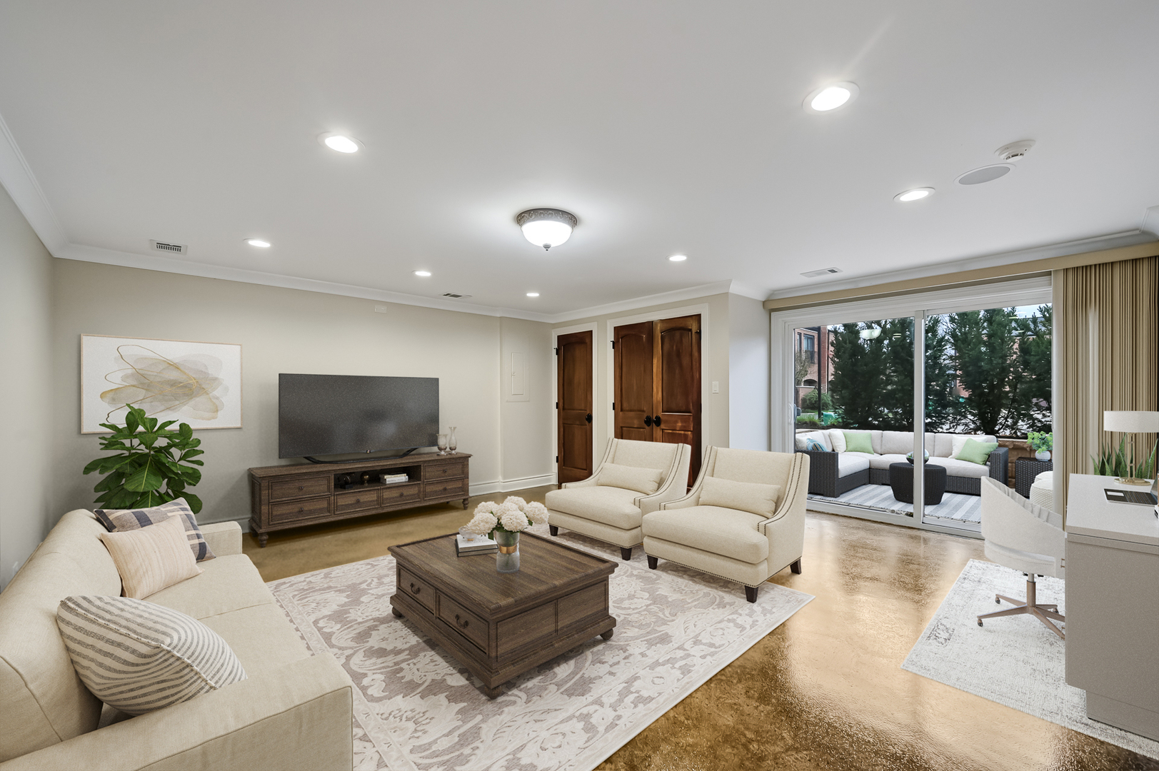 2-s719 Williamsburg Court Oak Brook, IL 60523 - Photo 35 of 48 a living room with furniture and a flat screen tv