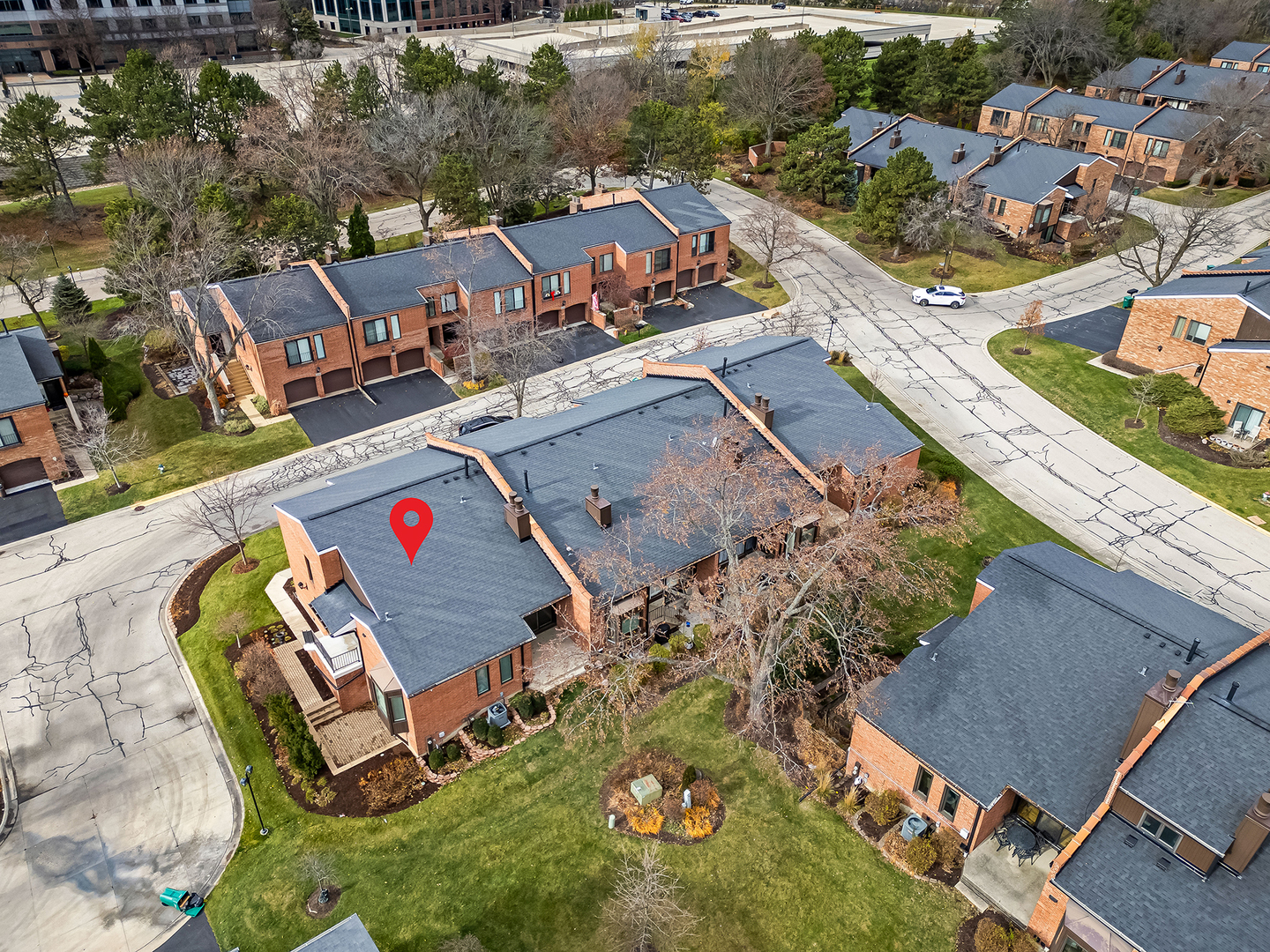 2-s719 Williamsburg Court Oak Brook, IL 60523 - Photo 42 of 48 an aerial view of a house with a swimming pool