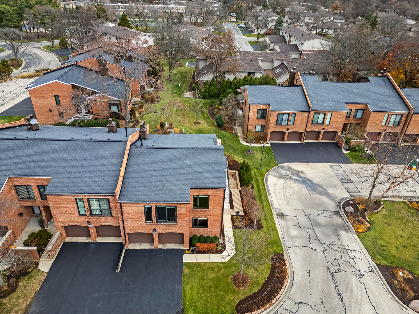 2-s719 Williamsburg Court Oak Brook, IL 60523 - Photo 43 of 48 an aerial view of a house with swimming pool and sitting area