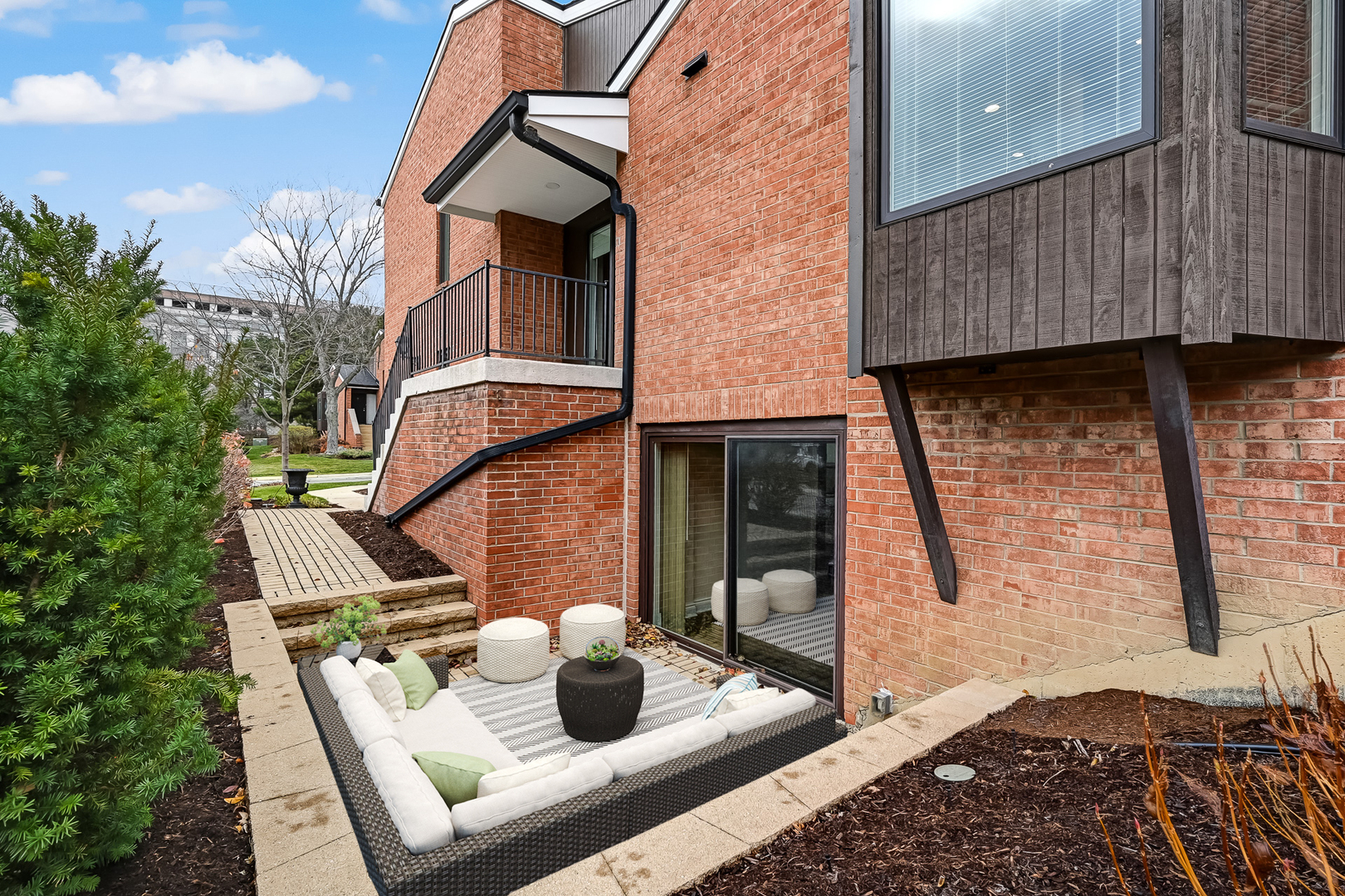 2-s719 Williamsburg Court Oak Brook, IL 60523 - Photo 6 of 48 a view of backyard with sitting area