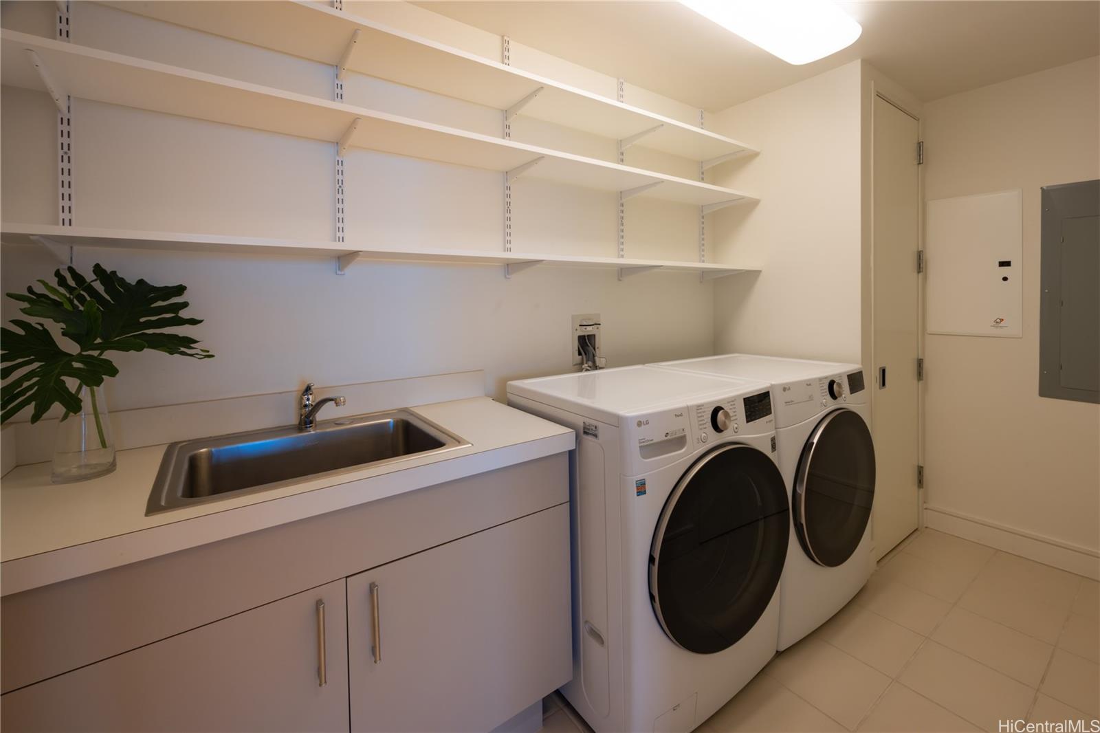 1288 Ala Moana Boulevard, Unit 37I Honolulu, HI 96814 - Photo 16 of 24 a utility room with dryer and washer