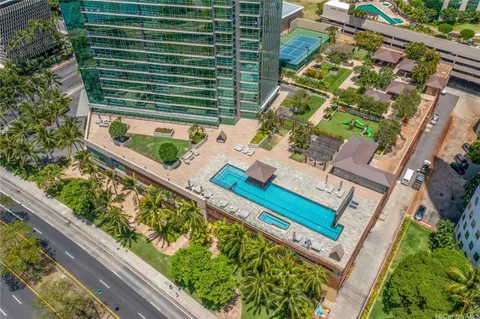 a view of a yard with an outdoor seating