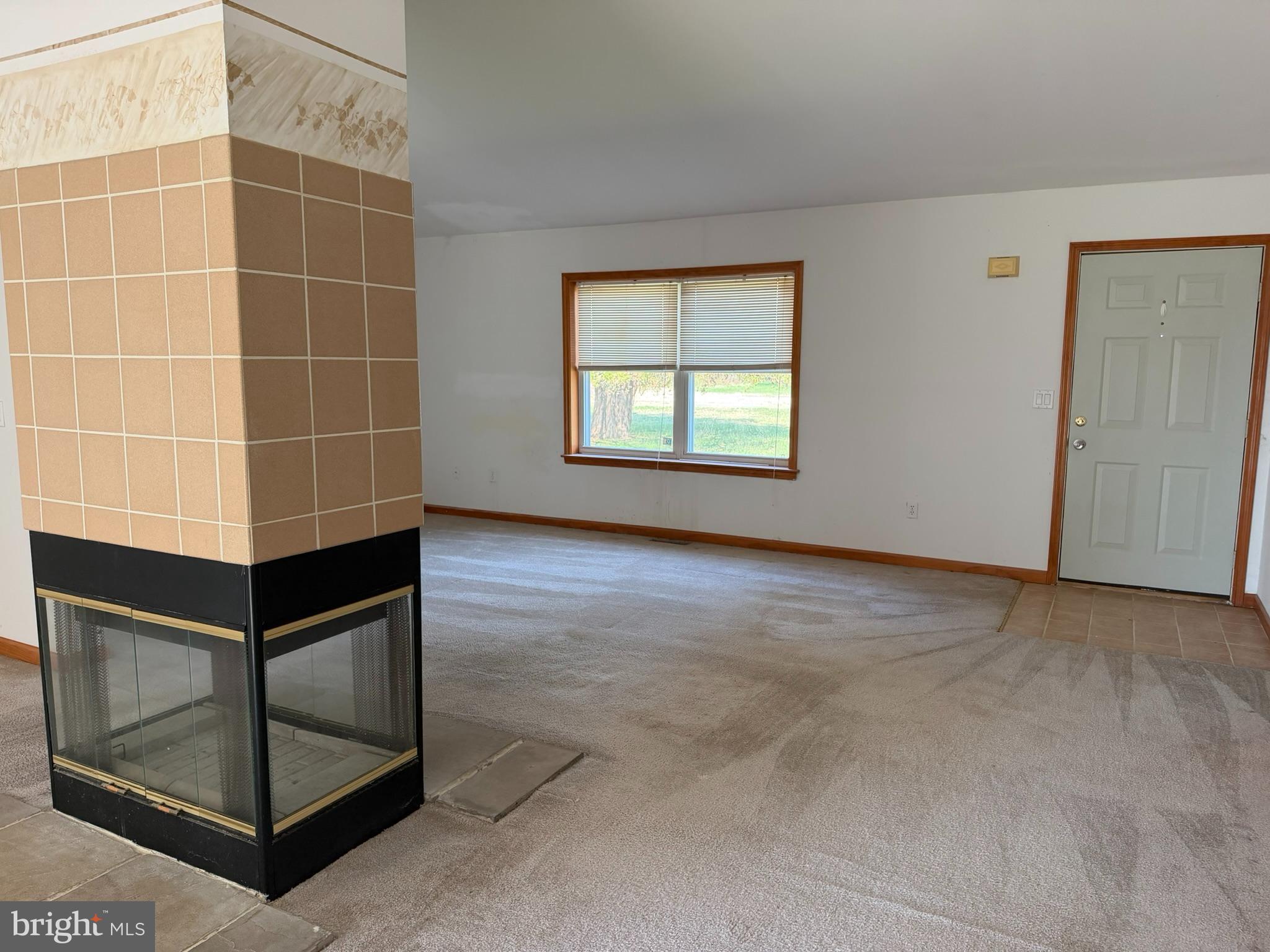 261 Andrews Lake Road Felton, DE 19943 - Photo 16 of 21 a view of an empty room with a window