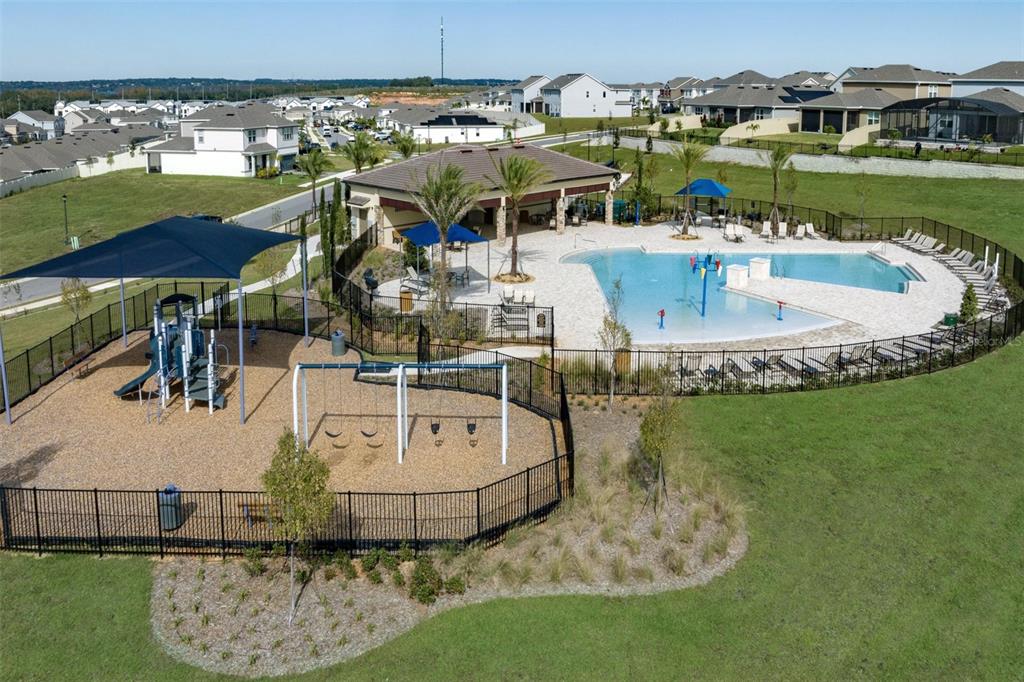7882 Trapani Loop Clermont, FL 34714 - Photo 4 of 7 an aerial view of a house with outdoor space